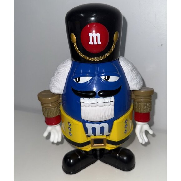 M&M Candy Dispenser Nutcracker Blue Yellow Holiday Limited Edition Toy Soldier - Picture 1 of 4